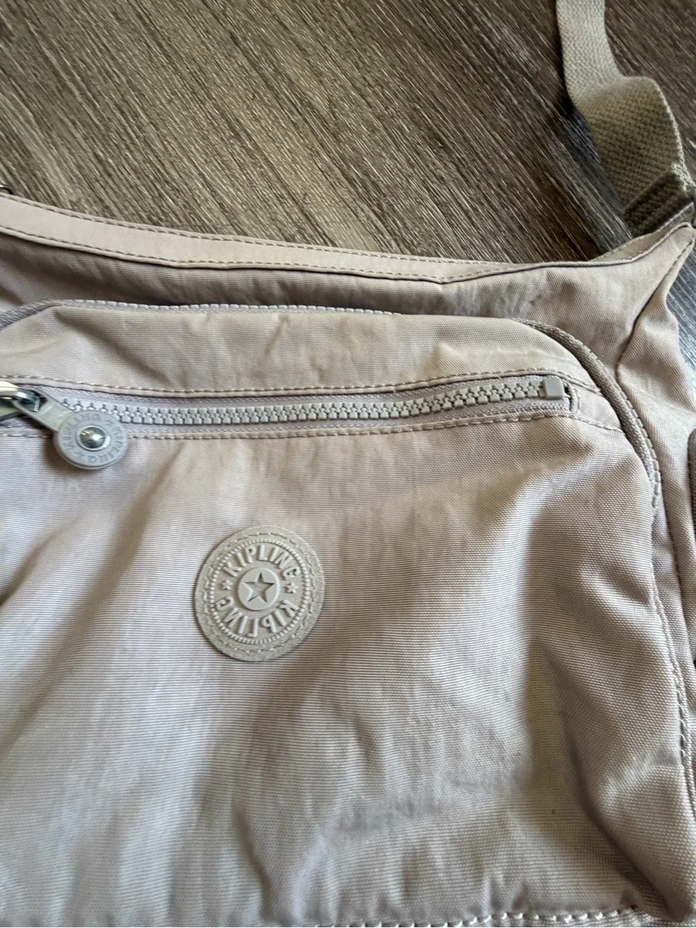 Kipling Light Beige Crossbody Bag with Multiple Zips